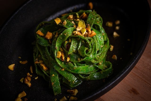 herbs growing on bright windowsill in traditional Irish stone cottage kitchen